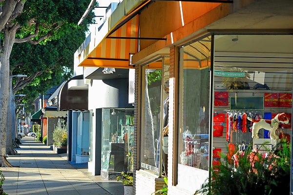 small local business shops along a sunny street